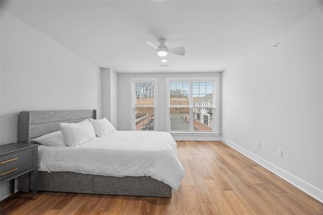 lighting, ceiling fan, Large windows with custom blinds | Image 25