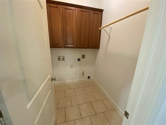 Laundry room with full size washer/dryer connections | Image 33