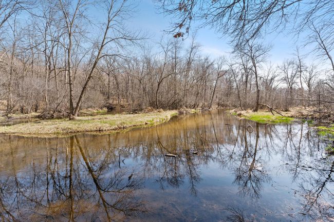 Welcome to tranquility with 650' of shoreline on the Sunrise River. | Image 40