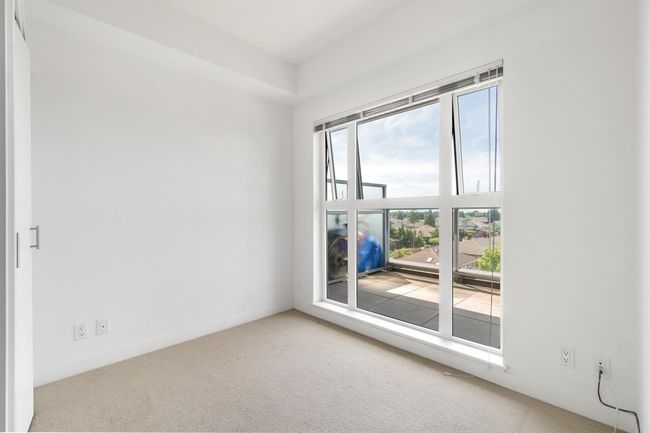 Carpeted empty room with baseboards | Image 17