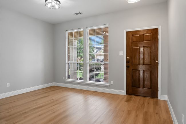 Foyer entrance featuring light wood-style flooring and baseboards | Image 21
