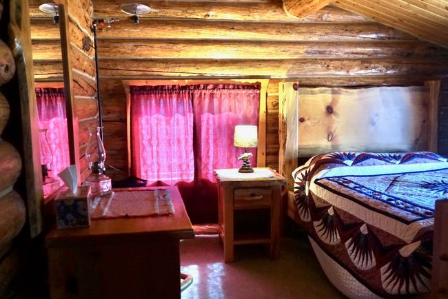 Upstairs Bedroom featuring vaulted ceiling and rustic walls | Image 43