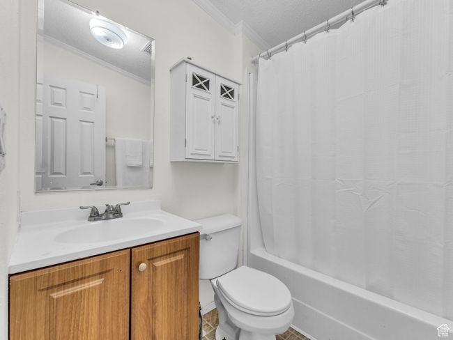Full bath featuring shower / bath combo | Image 16