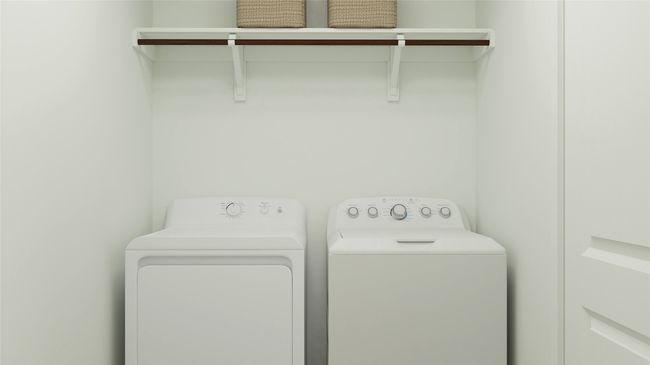 Laundry area with washing machine and clothes dryer | Image 6