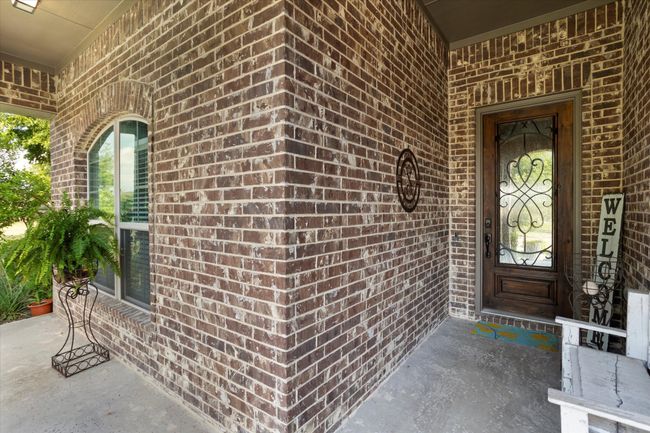 Entrance to property with brick siding | Image 4
