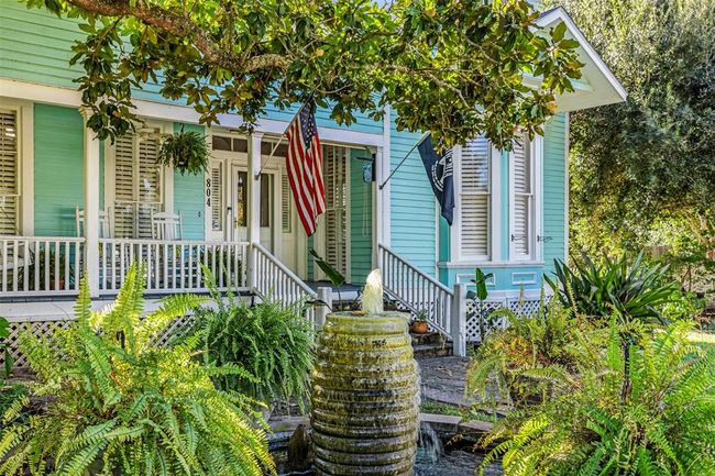 Relaxing water feature adds to the relaxing vibe of your front porch and lofty, shady, mature trees. | Image 22