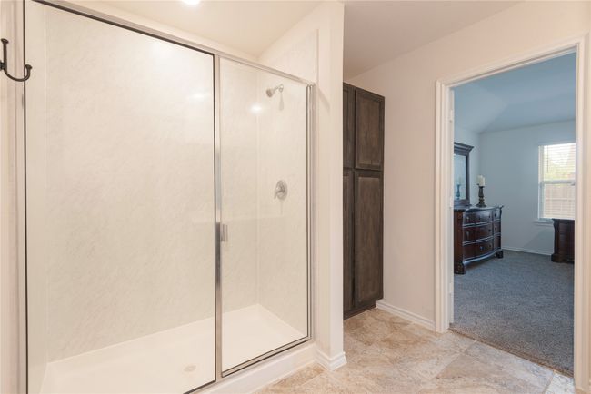 Full bathroom featuring a shower stall | Image 14