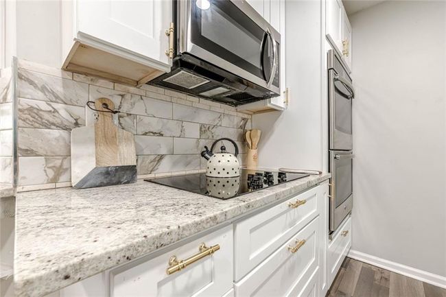 3349 Old Atlanta Rd, House other with 3 bedrooms, 2 bathrooms and 2 parking in Suwanee GA | Image 5