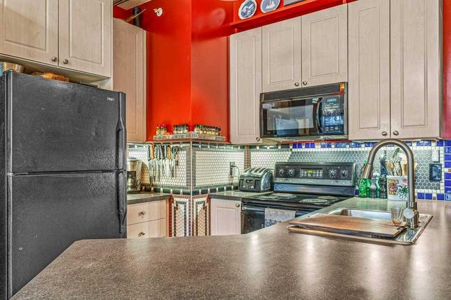 307 - 176 Kananaskis Way, Condo with 2 bedrooms, 1 bathrooms and 2 parking in Canmore AB | Image 12