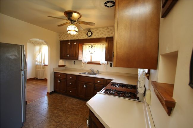 Another View of Kitchen w/ Archway into Dining Room | Image 8