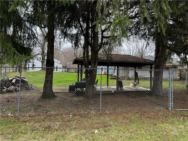 View of yard featuring fence | Image 27