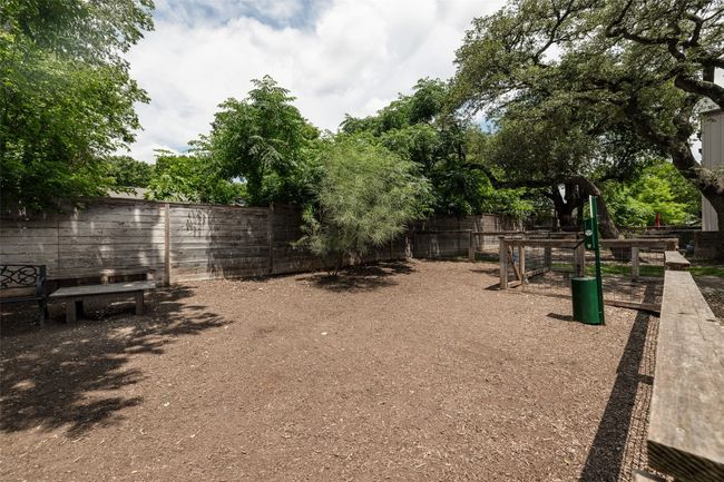 View of yard with a fenced backyard | Image 29