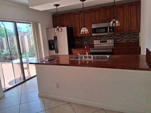 8369-8369 N Coral Cir, North Lauderdale, FL, 33068-4142 | Card Image