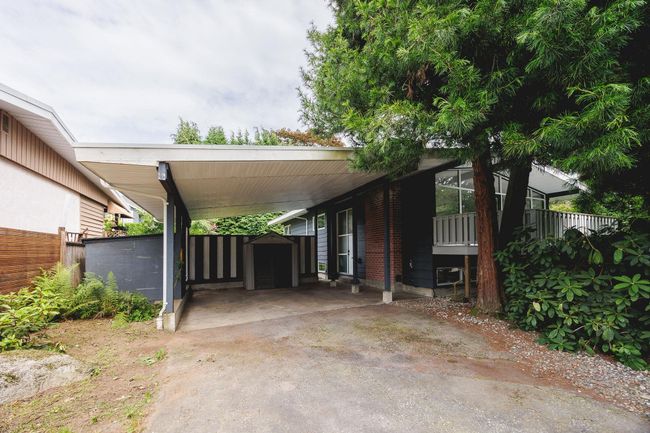 View of front of house featuring an attached carport | Image 25