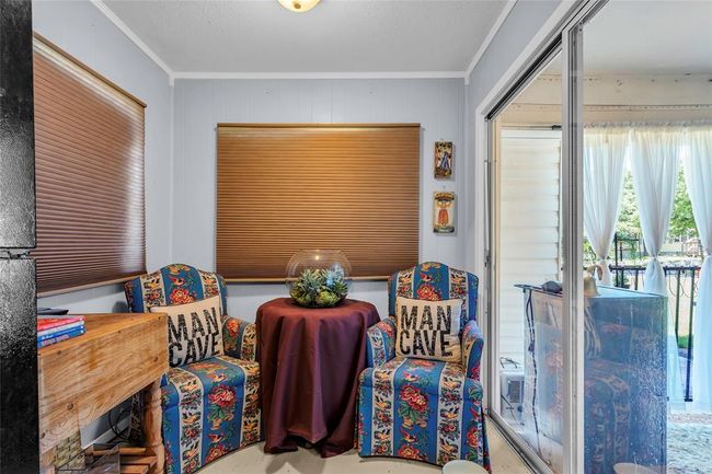 Living area featuring ornamental molding | Image 36