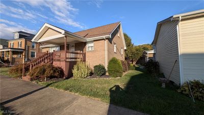 View of side of property featuring a yard | Image 3