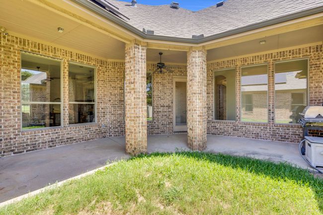 View of patio / terrace featuring ceiling fan | Image 34