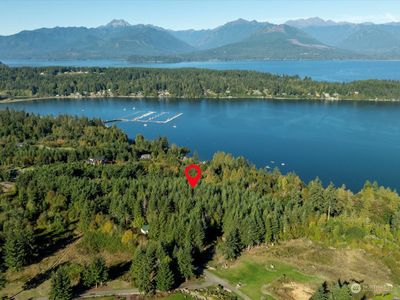 Majestic views of the Olympic Mountains and Hood Canal. This quintessential property awaits the most discerning eye to create an amazing get-a-way from the crowd! Quiet, peaceful and Oh So Beautiful. | Image 1