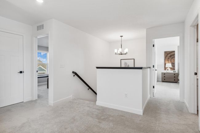 (Photo of model home, actual features may vary) The stairs lead up to a centrally located loft that is spacious and versatile. | Image 7