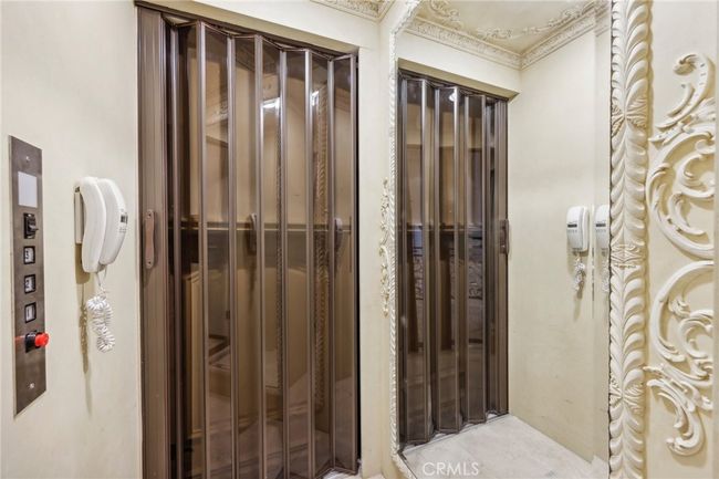 Elevator to 3 levels - 2 stories and step-down to garage. | Image 29
