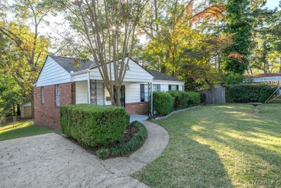 Fenced backyard and detached garage/workshop in backyard. | Image 3