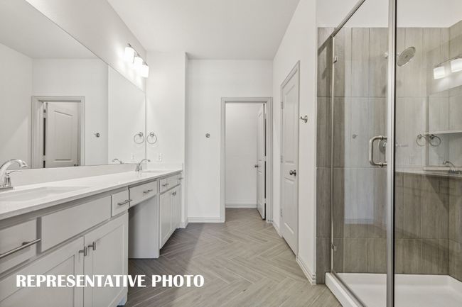 No shortage of space or style in this wonderful owner's bath! REPRESENTATIVE PHOTO | Image 11