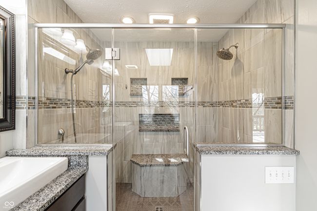 full bathroom featuring recessed lighting, vanity, and a stall shower | Image 30