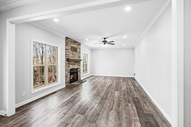 Family Room with stone fireplace. The views from this room are spectacular! | Image 23