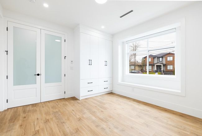 Unfurnished bedroom with light wood-style flooring | Image 20
