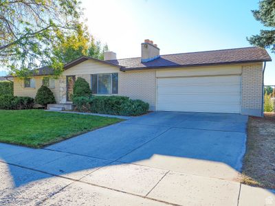 2319 W Ledgewood Dr, House other with 5 bedrooms, 2 bathrooms and 2 parking in Taylorsville UT | Image 3