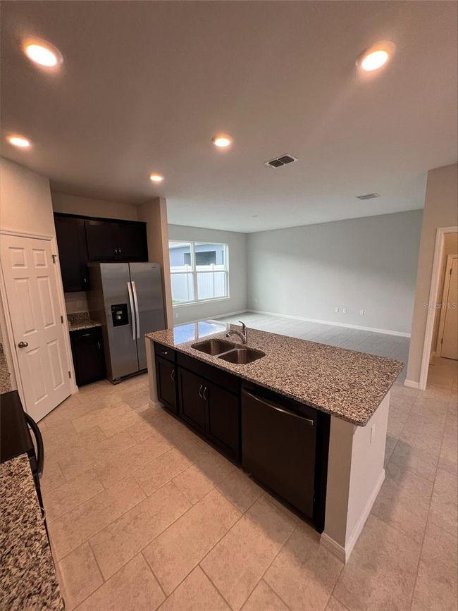 4989 Avalon Park Boulevard, Townhouse with 3 bedrooms, 2 bathrooms and null parking in Wesley Chapel FL | Image 3