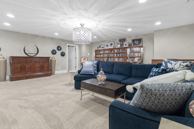 Amazing lower level family room is perfect for entertaining. | Image 16