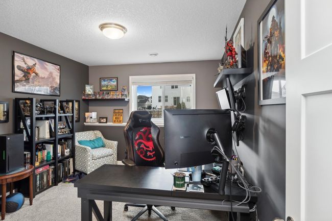 A fifth bedroom provides added flexibility, making it perfect for guests, an office, or a hobby room, while the adjacent full bathroom adds convenience. | Image 20