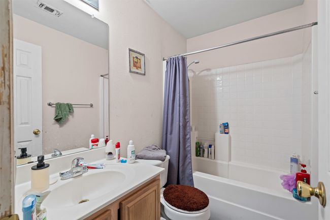 Full bath with vanity and shower / bath combo with shower curtain | Image 18