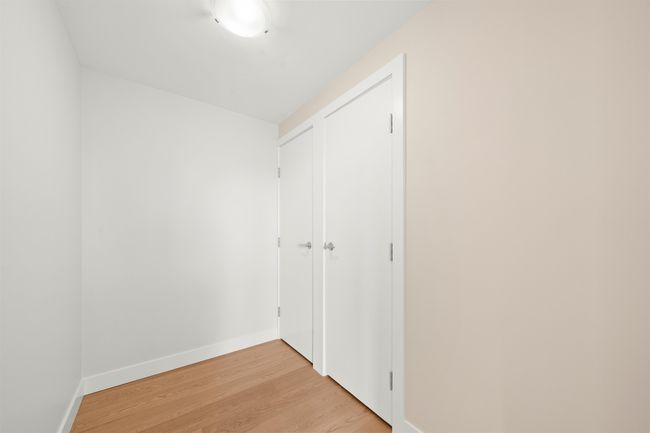 Interior space with light wood-style flooring and baseboards | Image 10