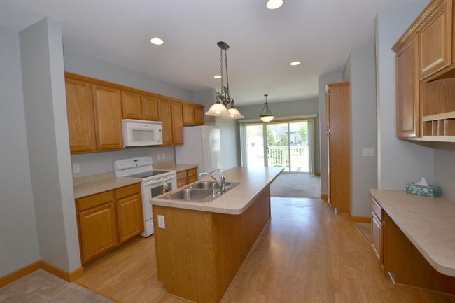 Spacious Kitchen for All Your Cooking Needs. Enjoy ample counter space, storage, and room to cook, prep, and entertain with ease. | Image 8