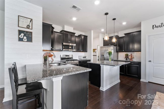 Open Kitchen with Island and Bar seating | Image 13