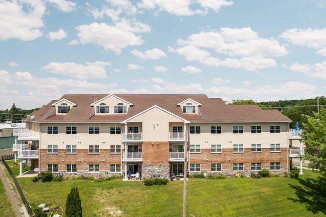 UNIT-104 - 301 N Lake St, Condo with 2 bedrooms, 2 bathrooms and null parking in Cadillac MI | Image 35