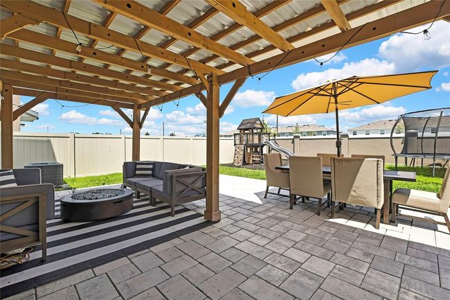 9188 Forge Breeze Loop, House other with 4 bedrooms, 3 bathrooms and null parking in WESLEY CHAPEL FL | Image 36