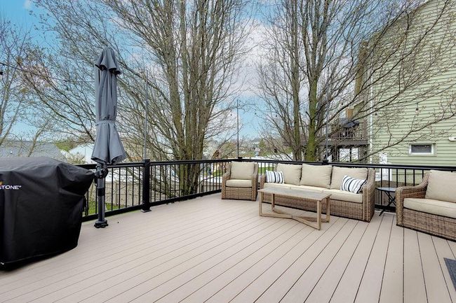 New composite deck overlooking back yard. | Image 45