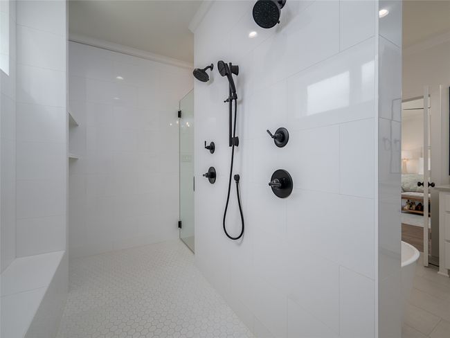 Full bathroom with walk in shower, crown molding, tile patterned floors, and ensuite bathroom | Image 21