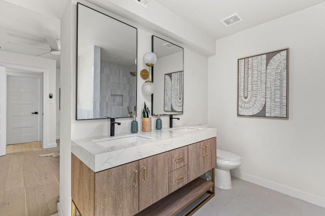 Bathroom with double vanity and ceiling fan | Image 29