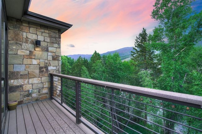 Balcony at dusk featuring a mountain view | Image 19