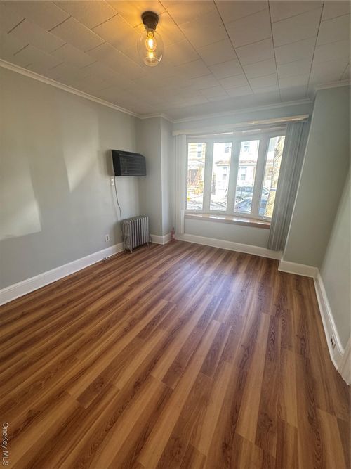 7834 79th Street, New York, NY, 11385 | Card Image