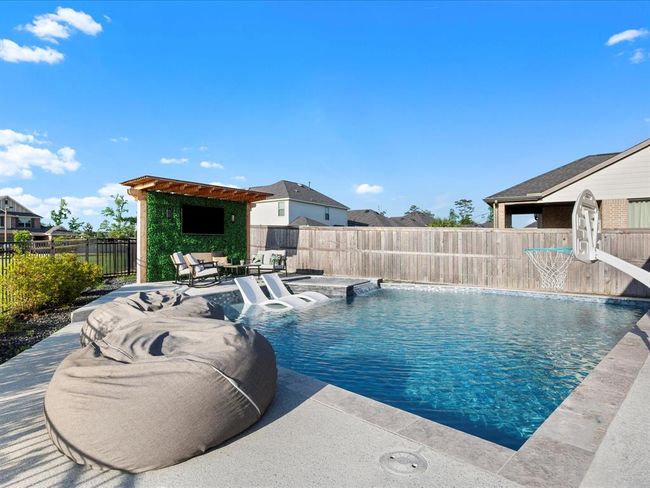9715 Migrant Hawker Ct, House other with 4 bedrooms, 3 bathrooms and 2 parking in Conroe TX | Image 28