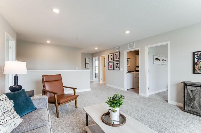 The upper-level loft provides an additional full size living space! | Image 17