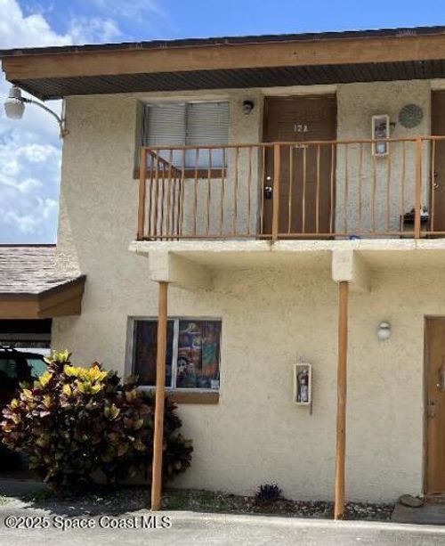 12a-105 Palmetto Ave, Merritt Island, FL, 32953-3404 | Card Image
