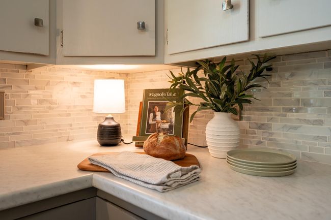This one-level home has seen a long list of improvements, including a fenced backyard (2024), radon mitigation system (2023), water heater (2024), new carpet (2023), fresh paint, and updated window treatments. | Image 9