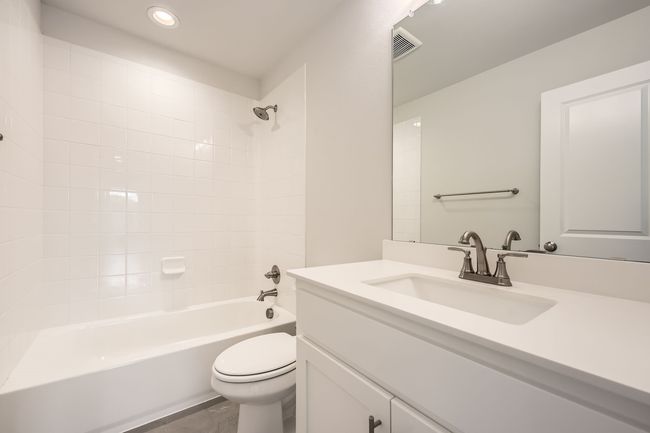 Full bath featuring vanity, bathtub / shower combination, and recessed lighting | Image 24