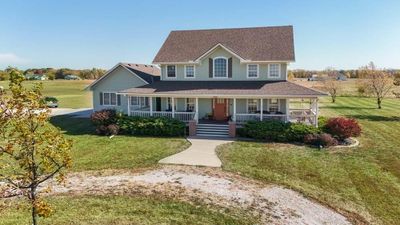 View of front of home with a front lawn and a porch | Image 3